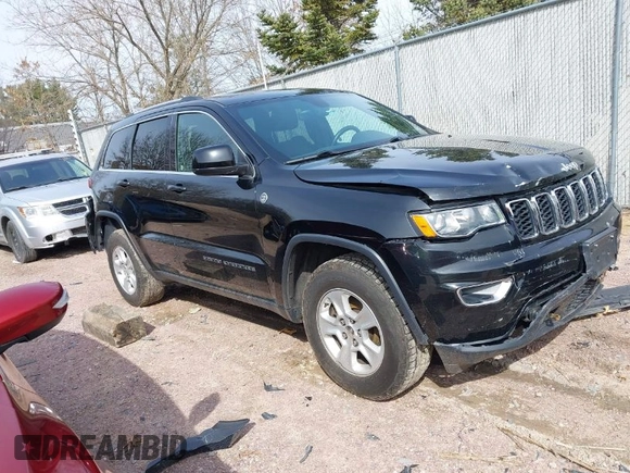 2017 Jeep Grand Cherokee Laredo with VIN 1C4RJFAGXHC863904, listed as a IAAI auction lot 41914465 with 122,981 mi miles. Bid and sale history available at carsss.com. Image 1.