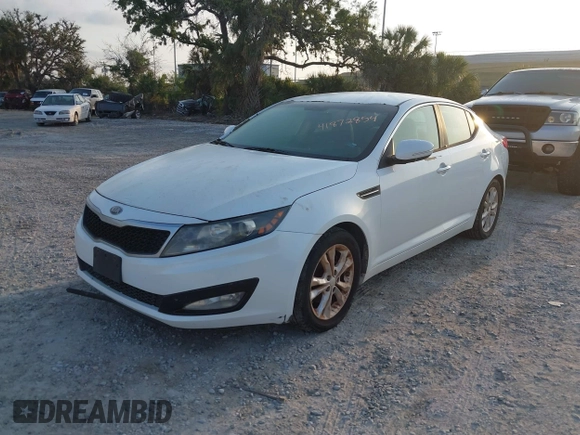 2013 Kia Optima LX with VIN 5XXGM4A77DG116306, listed as a IAAI auction lot 41872854 with 204,101 mi miles and . Bid and sale history available at carsss.com. Image 2.