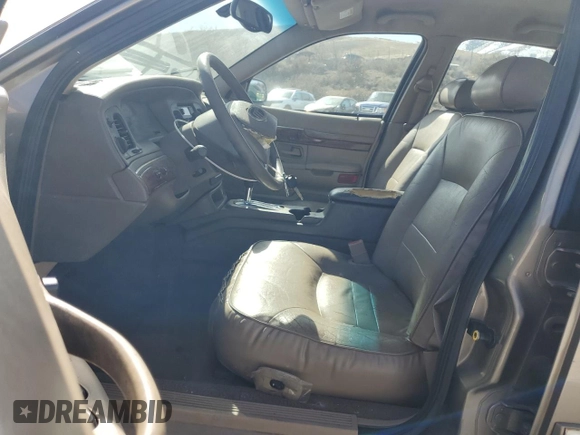 2002 Mercury Grand Marquis LS Premium with VIN 2MEFM75W42X656516, listed as a Copart auction lot 46897365 with 162,861 mi miles and Salvage Title. Bid and sale history available at DreamBid. Image 7.