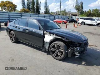 2023 BMW 3 Series 330i with VIN 3MW69FF05P8D21152, listed as a Copart auction lot 48803345 with 21,146 mi miles and Salvage title. Bid and sale history available at DreamBid. Image 4.