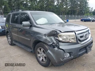 2009 Honda Pilot Touring z VIN 5FNYF48879B024183, wystawiony jako IAAI lot #42504901 z przebiegiem 163 971 mil mil oraz . Historia ofert i sprzedaży dostępna na DreamBid. Obrazek 1.