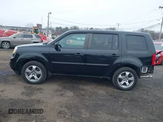 2013 Honda Pilot EX-L with VIN 5FNYF4H71DB021487, listed as a IAAI auction lot 41272308 with 188,217 mi miles and . Bid and sale history available at DreamBid. Image 14.