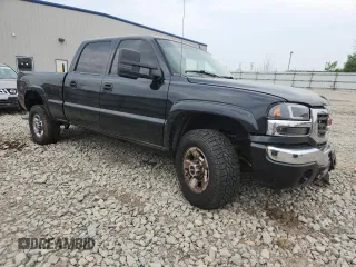 2005 GMC Sierra 2500HD SLE z VIN 1GTHK23U35F816096, wystawiony jako Copart lot #60911045 z przebiegiem 155 164 mil mil oraz Czysty tytuł • Clean title. Historia ofert i sprzedaży dostępna na DreamBid. Obrazek 4.