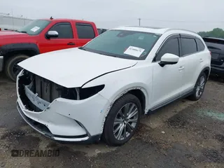 2021 Mazda CX-9 Signature with VIN JM3TCBEY4M0517118, listed as a IAAI auction lot 42400675 with 56,260 mi miles and . Bid and sale history available at DreamBid. Image 22.