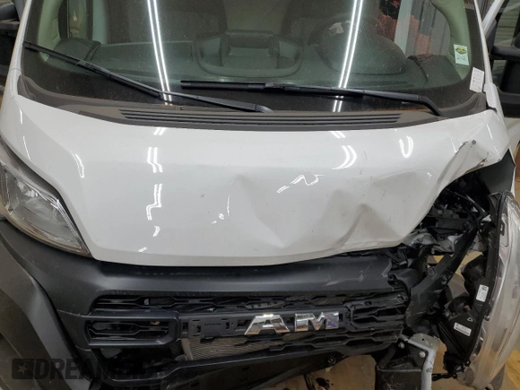 2024 Ram ProMaster Cargo Tradesman with VIN 3C6LRVDG7RE140047, listed as a Copart auction lot 42203605 with 6,015 mi miles and Salvage Title. Bid and sale history available at DreamBid. Image 12.
