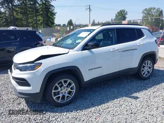 2022 Jeep Compass Latitude Lux with VIN 3C4NJDFB6NT164933, listed as a IAAI auction lot 42116735 with 55,397 mi miles and . Bid and sale history available at DreamBid. Image 2.