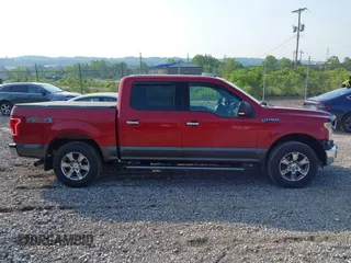 2015 Ford F-150 XLT with VIN 1FTEW1EF7FFC13203, listed as a IAAI auction lot 42479929 with 76,123 mi miles and . Bid and sale history available at DreamBid. Image 13.