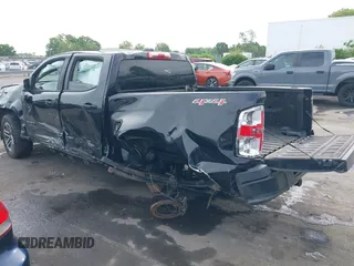 2020 Chevrolet Colorado 4WD Work Truck z VIN 1GCGTBEN0L1134432, wystawiony jako IAAI lot #42097672 z przebiegiem 104 946 mil mil oraz . Historia ofert i sprzedaży dostępna na DreamBid. Obrazek 3.