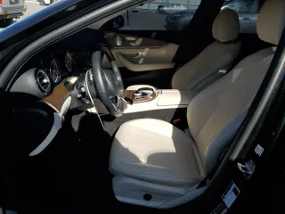 2018 Mercedes-Benz E 300 with VIN WDDZF4KBXJA464197, listed as a Copart auction lot 53205215 with 38,002 mi miles and Salvage title. Bid and sale history available at DreamBid. Image 7.