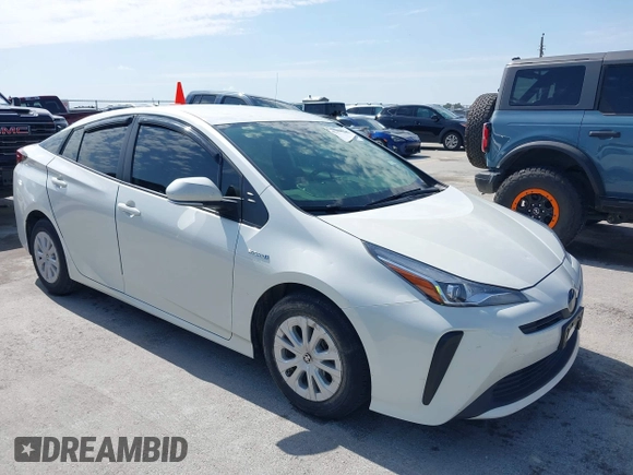 2020 Toyota Prius L Eco z VIN JTDKARFU8L3126291, wystawiony jako IAAI lot #42190242 z przebiegiem 60 404 mil mil oraz . Historia ofert i sprzedaży dostępna na DreamBid. Obrazek 1.