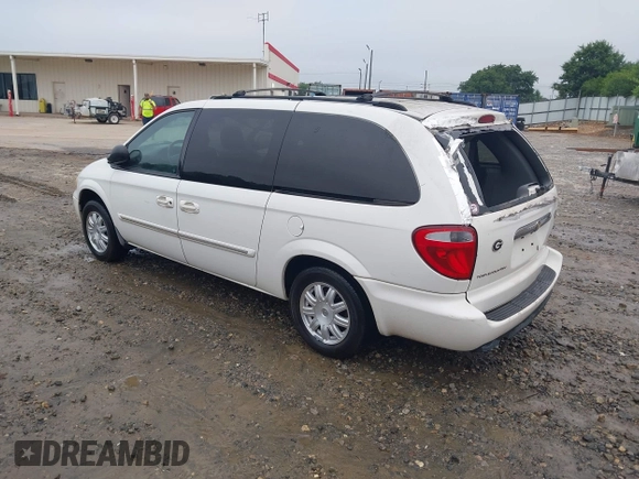 2006 Chrysler Town & Country Touring z VIN 2A4GP54L76R915853, wystawiony jako IAAI lot #42361966 z przebiegiem 250 782 mil mil oraz . Historia ofert i sprzedaży dostępna na DreamBid. Obrazek 3.