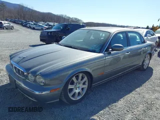 2005 Jaguar XJ with VIN SAJWA79C85SG48974, listed as a IAAI auction lot 41844684 with 154,145 mi miles. Bid and sale history available at carsss.com. Image 6.