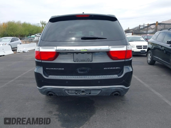 2012 Dodge Durango Citadel with VIN 1C4SDHET9CC229729, listed as a IAAI auction lot 41893819 with 167,519 mi miles and . Bid and sale history available at DreamBid. Image 16.