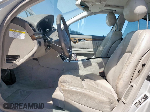 2005 Mercedes-Benz E 5.0L with VIN WDBUF70J95A718132, listed as a Copart auction lot 51620185 with 249,876 mi miles and Salvage Title. Bid and sale history available at carsss.com. Image 7.