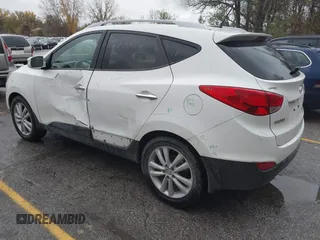 2013 Hyundai Tucson GLS with VIN KM8JU3AC4DU675511, listed as a IAAI auction lot 40765852 with 147,061 mi miles. Bid and sale history available at carsss.com. Image 3.