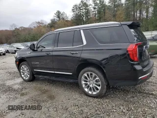 2023 GMC Yukon SLT with VIN 1GKS2BKD7PR122685, listed as a Copart auction lot 84611444 with 52,271 mi miles and Salvage Title. Bid and sale history available at carsss.com. Image 2.