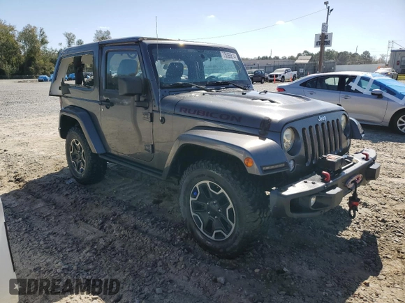 2014 Jeep Wrangler Rubicon with VIN 1C4BJWCG1EL168575, listed as a Copart auction lot 75095814 with 65,770 mi miles and Salvage title. Bid and sale history available at DreamBid. Image 4.