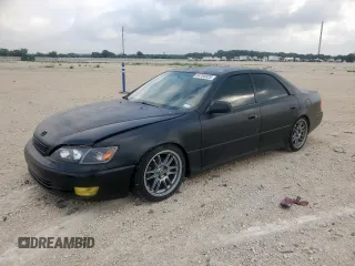 1998 Lexus ES 300 with VIN JT8BF28G7W5051414, listed as a Copart auction lot 64765925 with 159,870 mi miles and Salvage title. Bid and sale history available at DreamBid. Image 1.