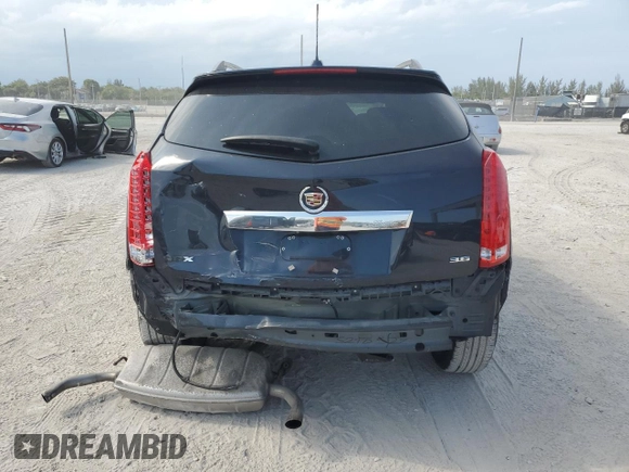 2016 Cadillac SRX Luxury Collection with VIN 3GYFNBE37GS516735, listed as a Copart auction lot 58193765 with 82,329 mi miles and Salvage title. Bid and sale history available at DreamBid. Image 6.