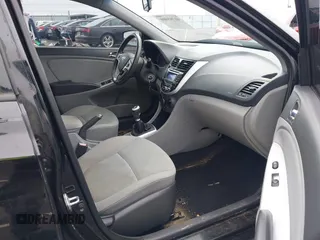 2012 Hyundai Accent SE with VIN KMHCU5AE1CU035390, listed as a IAAI auction lot 41765900 with 127,685 mi miles. Bid and sale history available at carsss.com. Image 5.