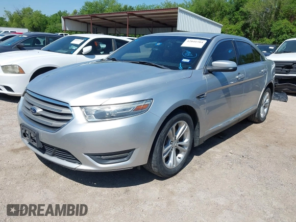 2013 Ford Taurus SEL with VIN 1FAHP2E83DG111766, listed as a IAAI auction lot 42041504 with 158,468 mi miles. Bid and sale history available at carsss.com. Image 2.