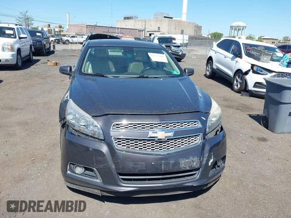 2013 Chevrolet Malibu LTZ with VIN 1G11J5SX6DF335333, listed as a IAAI auction lot 42135480 with 158,743 mi miles and . Bid and sale history available at DreamBid. Image 6.