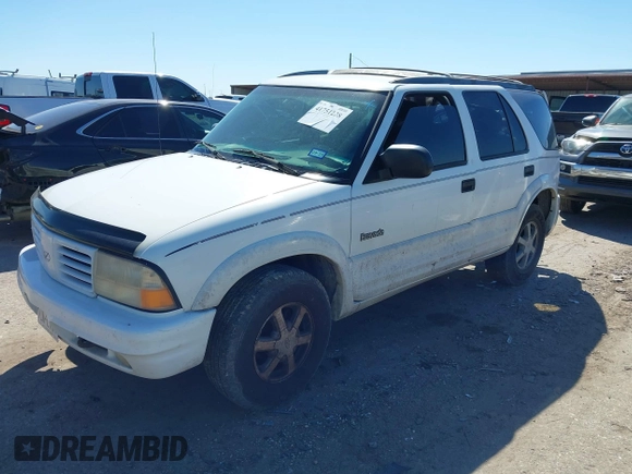 2000 Oldsmobile Bravada z VIN 1GHDT13WXY2284231, wystawiony jako IAAI lot #41751228 z przebiegiem 151 477 mil mil oraz . Historia ofert i sprzedaży dostępna na DreamBid. Obrazek 17.