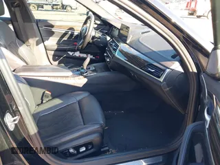 2018 BMW 5 Series M550i xDrive with VIN WBAJB9C55JB049529, listed as a IAAI auction lot 41241917 with 116,265 mi miles and . Bid and sale history available at carsss.com. Image 5.