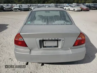 2001 Mitsubishi Mirage ES z VIN JA3AY26CX1U030593, wystawiony jako Copart lot #83749264 z przebiegiem 107 641 mil mil oraz Szkoda całkowita • Salvage title. Historia ofert i sprzedaży dostępna na DreamBid. Obrazek 6.