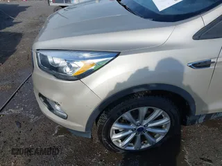 2017 Ford Escape Titanium with VIN 1FMCU0JD3HUB19602, listed as a IAAI auction lot 41816296 with 70,311 mi miles. Bid and sale history available at carsss.com. Image 17.