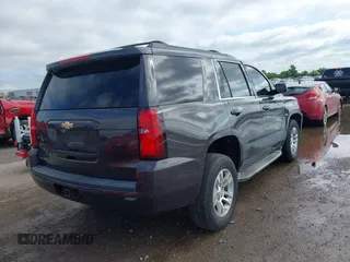 2015 Chevrolet Tahoe LT with VIN 1GNSCBKC2FR632173, listed as a IAAI auction lot 42135105 with 150,033 mi miles and . Bid and sale history available at DreamBid. Image 4.