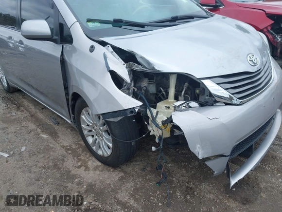 2012 Toyota Sienna XLE AAS with VIN 5TDYK3DC5CS260236, listed as a IAAI auction lot 41861457 with 123,530 mi miles and . Bid and sale history available at DreamBid. Image 6.