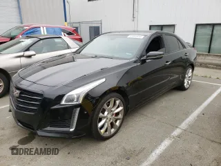 2015 Cadillac CTS Premium AWD z VIN 1G6AZ5S36F0121125, wystawiony jako Copart lot #52094934 z przebiegiem 127 553 mil mil oraz Szkoda całkowita • Salvage title. Historia ofert i sprzedaży dostępna na DreamBid. Obrazek 1.