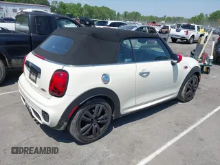 2021 MINI Convertible with VIN WMWWJ9C0XM3M07302, listed as a IAAI auction lot 42027854 with 30,921 mi miles and . Bid and sale history available at DreamBid. Image 4.