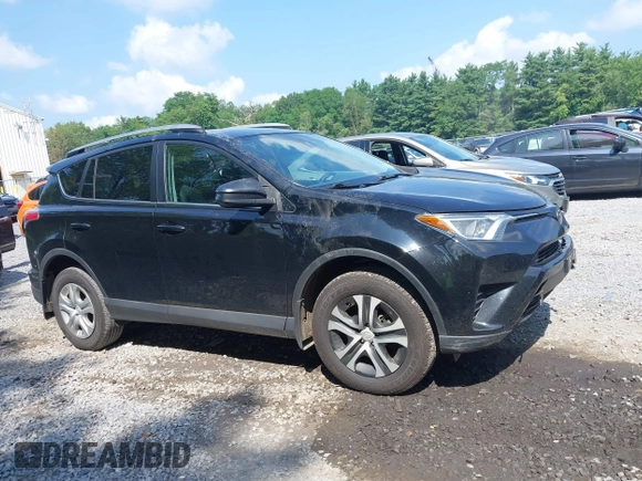 2017 Toyota RAV4 LE with VIN 2T3BFREV5HW651308, listed as a IAAI auction lot 42701783 with 112,829 mi miles and . Bid and sale history available at DreamBid. Image 13.