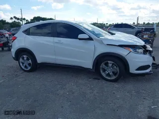 2021 Honda HR-V LX with VIN 3CZRU5H34MM726044, listed as a IAAI auction lot 41230932 with 39,134 mi miles. Bid and sale history available at carsss.com. Image 1.