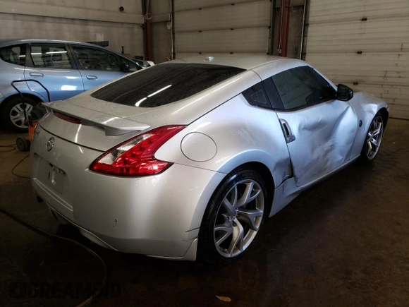2010 Nissan 370Z Touring with VIN JN1AZ4EH8AM505541, listed as a Copart auction lot 80988544 with 179,473 mi miles and Salvage Title. Bid and sale history available at carsss.com. Image 3.