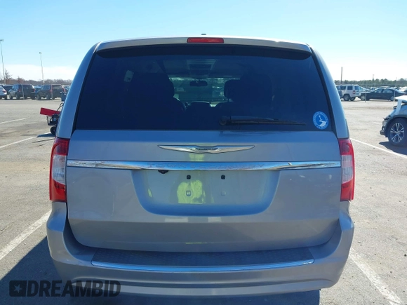 2013 Chrysler Town & Country Touring with VIN 2C4RC1BG9DR777819, listed as a IAAI auction lot 41824692 with 138,702 mi miles. Bid and sale history available at carsss.com. Image 16.