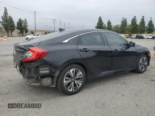 2016 Honda Civic EX-T z VIN 2HGFC1F33GH634029, wystawiony jako Copart lot #56026045 z przebiegiem 168 676 mil mil oraz Szkoda całkowita • Salvage title. Historia ofert i sprzedaży dostępna na DreamBid. Obrazek 3.