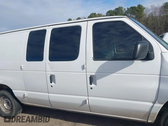 2002 Ford Econoline Cargo with VIN 1FTRE14252HB67887, listed as a IAAI auction lot 41180872 with 274,561 mi miles and . Bid and sale history available at carsss.com. Image 13.