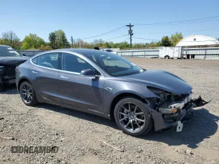 2018 Tesla Model 3 Long Range Battery with VIN 5YJ3E1EA4JF102085, listed as a Copart auction lot 54948625 with 74,786 mi miles and Salvage Title. Bid and sale history available at DreamBid. Image 4.