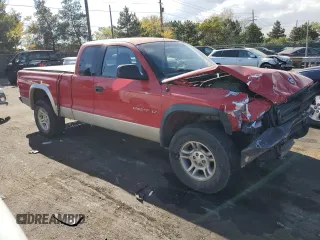 2001 Dodge Dakota Sport with VIN 1B7GG22N61S213300, listed as a Copart auction lot 76581804 with 105,460 mi miles and Salvage Title. Bid and sale history available at carsss.com. Image 4.
