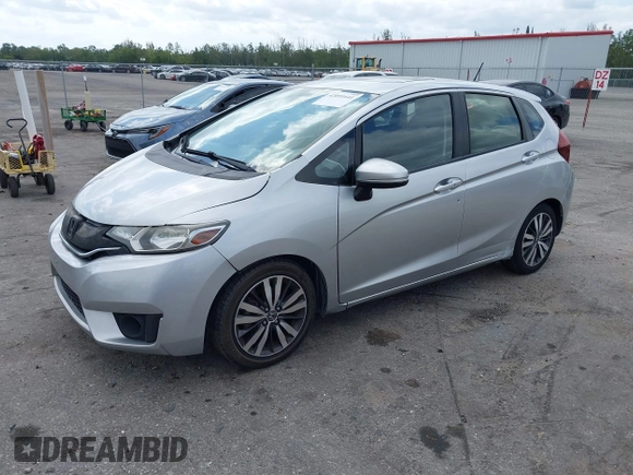 2016 Honda Fit EX with VIN JHMGK5H74GX000882, listed as a IAAI auction lot 42091641 with 64,210 mi miles and . Bid and sale history available at DreamBid. Image 2.