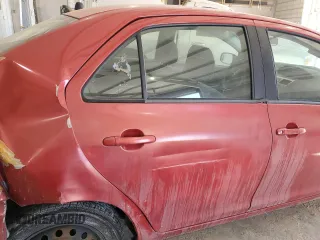 2009 Toyota Yaris with VIN JTDBT903891313898, listed as a Copart auction lot 87820085 with 212,806 mi miles and Salvage Title. Bid and sale history available at carsss.com. Image 10.