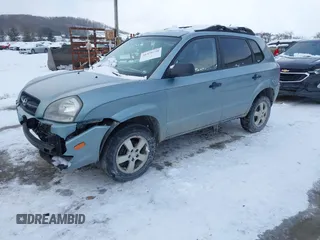2006 Hyundai Tucson GL with VIN KM8JM72B06U298904, listed as a IAAI auction lot 41370728 with 209,284 mi miles. Bid and sale history available at carsss.com. Image 17.