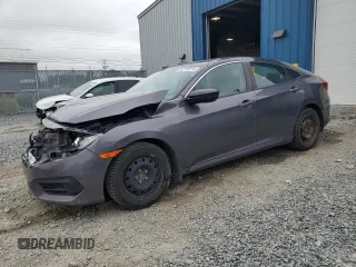 2017 Honda Civic z VIN 2HGFC2E20HH032317, wystawiony jako Copart lot #62190314 z przebiegiem 124 856 mil mil oraz Szkoda całkowita • Salvage title. Historia ofert i sprzedaży dostępna na DreamBid. Obrazek 1.
