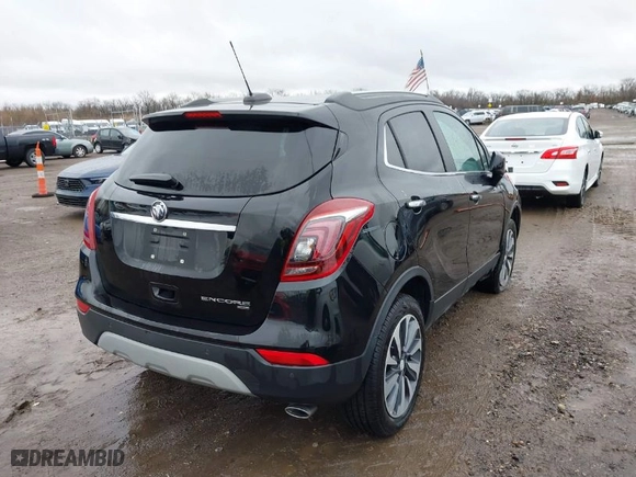 2021 Buick Encore Preferred with VIN KL4CJESB5MB300742, listed as a IAAI auction lot 41009716 with 13,964 mi miles. Bid and sale history available at carsss.com. Image 4.