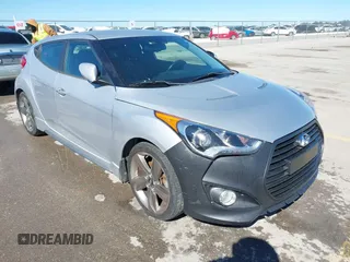 2013 Hyundai Veloster Turbo with VIN KMHTC6AE8DU180081, listed as a IAAI auction lot 41736188 with 86,076 mi miles and . Bid and sale history available at DreamBid. Image 1.