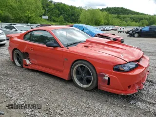 1995 Ford Mustang GT with VIN 1FALP42T7SF141936, listed as a Copart auction lot 56161595 with 91,903 mi miles and Salvage title. Bid and sale history available at DreamBid. Image 4.