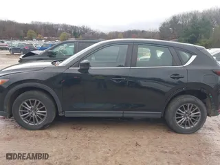 2017 Mazda CX-5 Sport with VIN JM3KFBBL5H0201857, listed as a IAAI auction lot 40885161 with 87,464 mi miles. Bid and sale history available at carsss.com. Image 14.